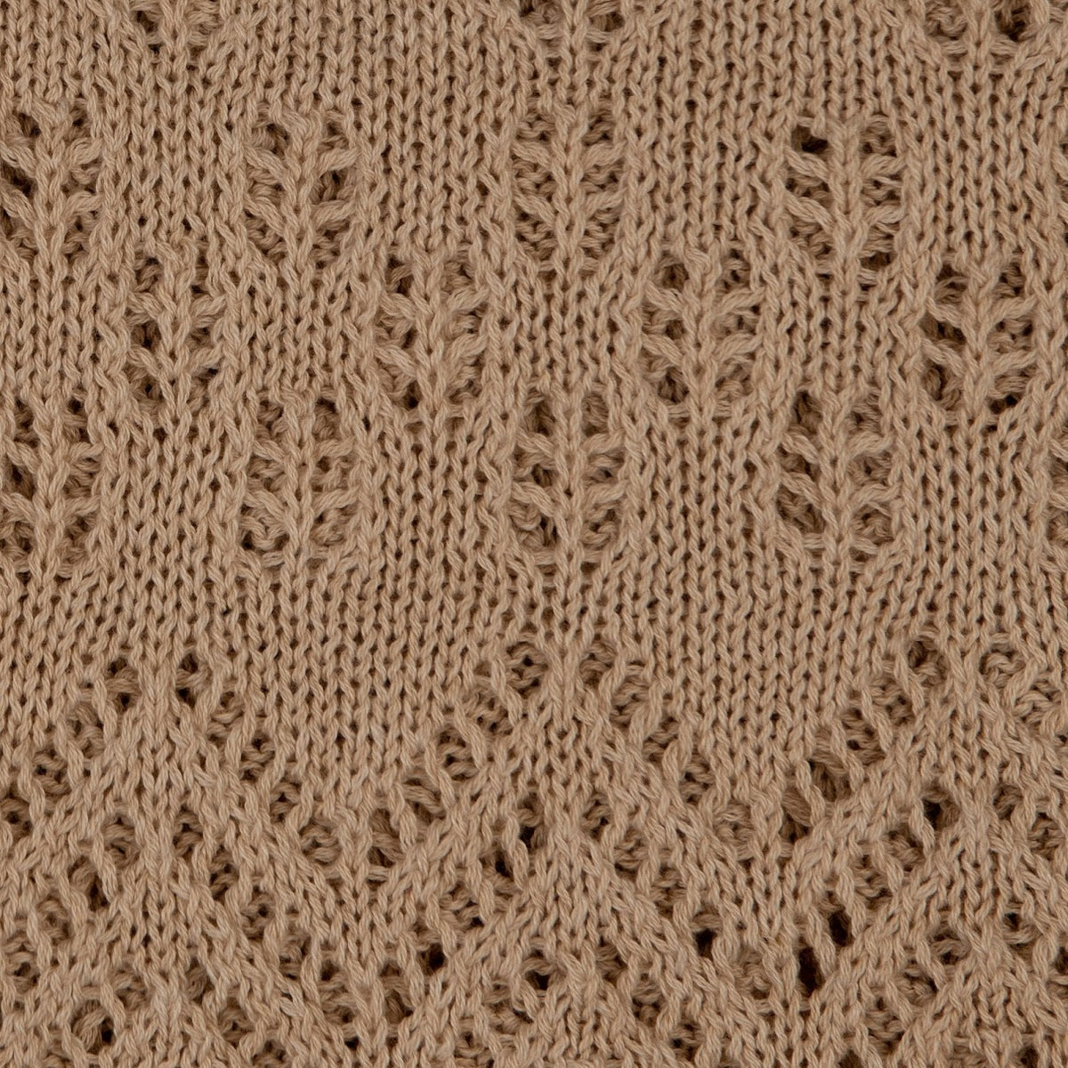 The Knitted Cotton Poncho Motiv