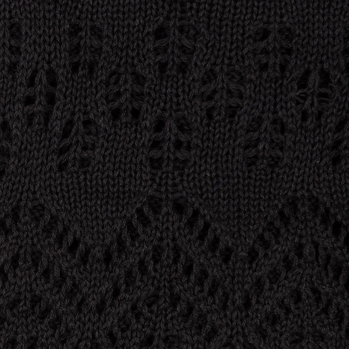 The Knitted Cotton Poncho Motiv