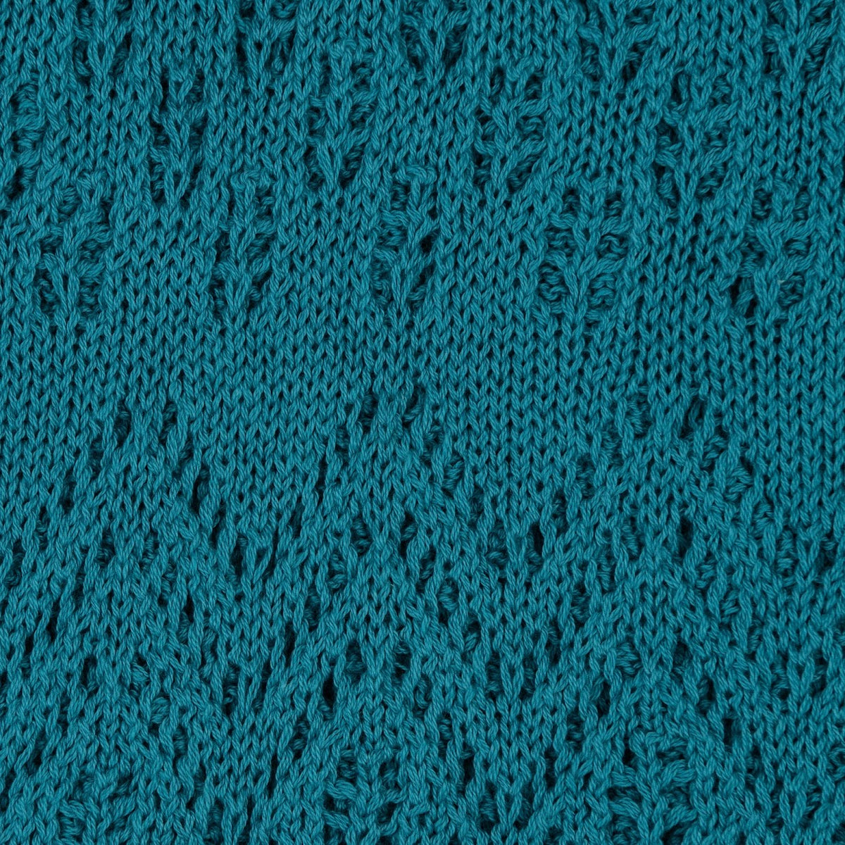 The Knitted Cotton Poncho Motiv