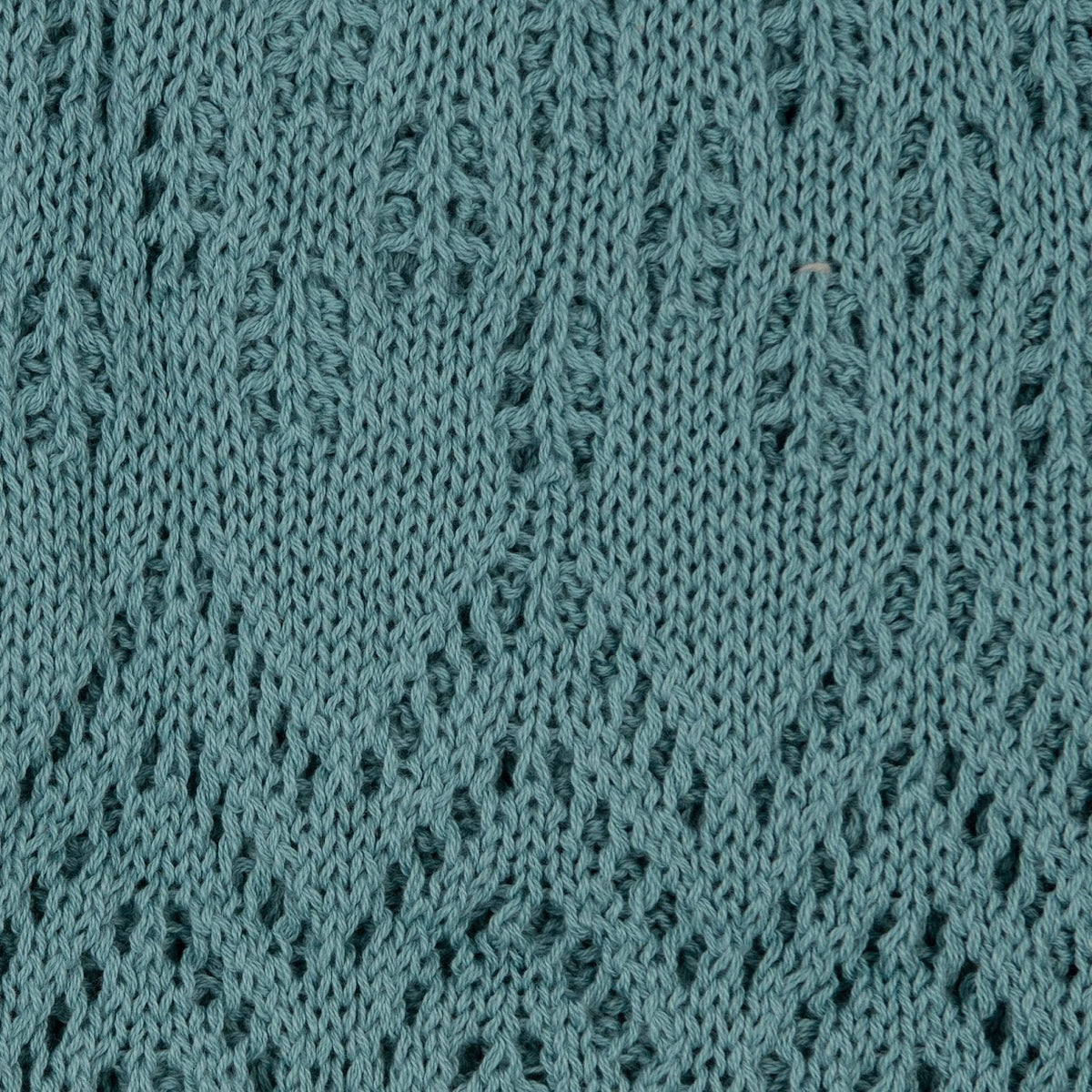 The Knitted Cotton Poncho Motiv