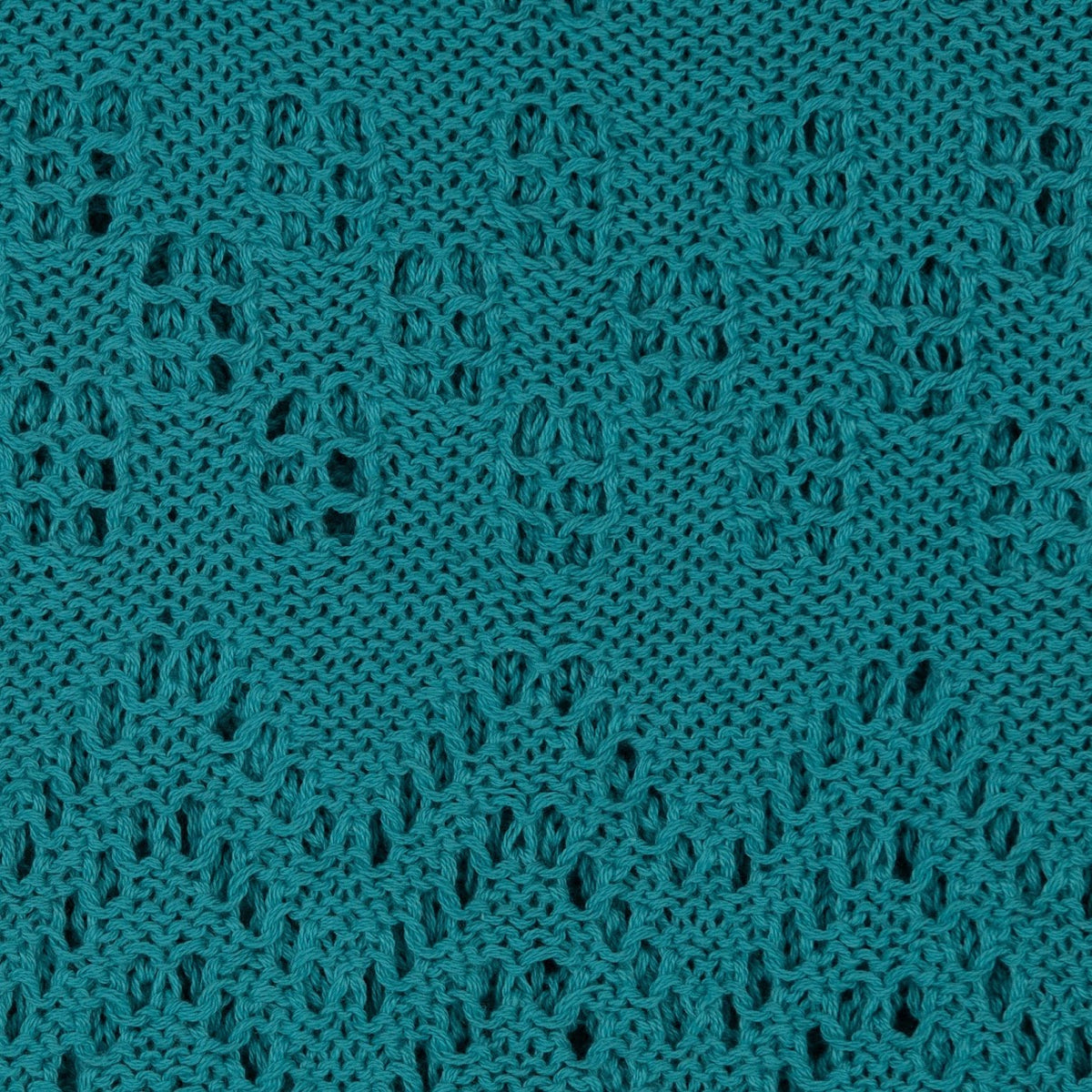 The Knitted Cotton Poncho Motiv