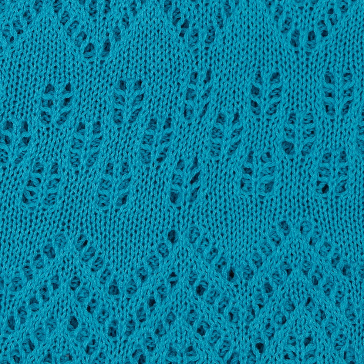 The Knitted Cotton Poncho Motiv