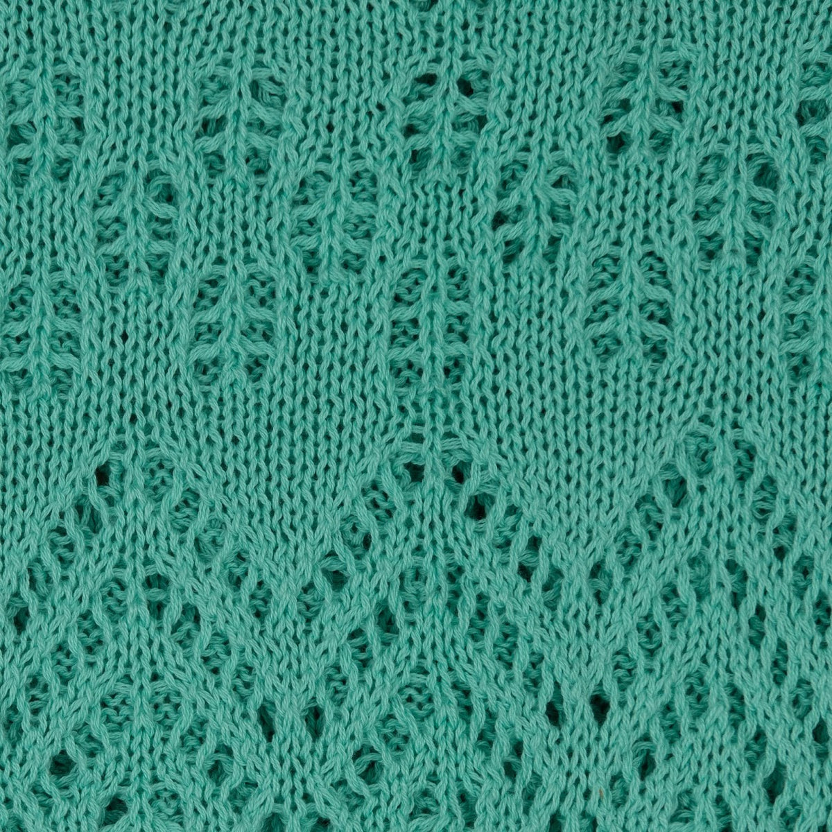 The Knitted Cotton Poncho Motiv